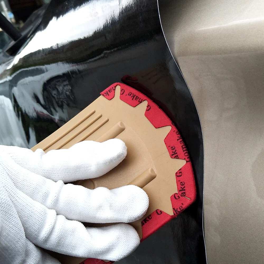 عکس محصول کاردک طلایی دارای لبه نیم‌دایره‌ای و قابلیت مغناطیس با لبه نمدی نازک